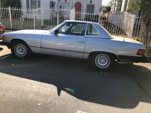 silver hardtop convertible roadster. recently driven from boston to los angeles