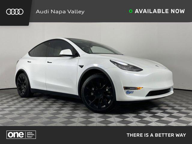2021 tesla model y standard range rear-wheel drive