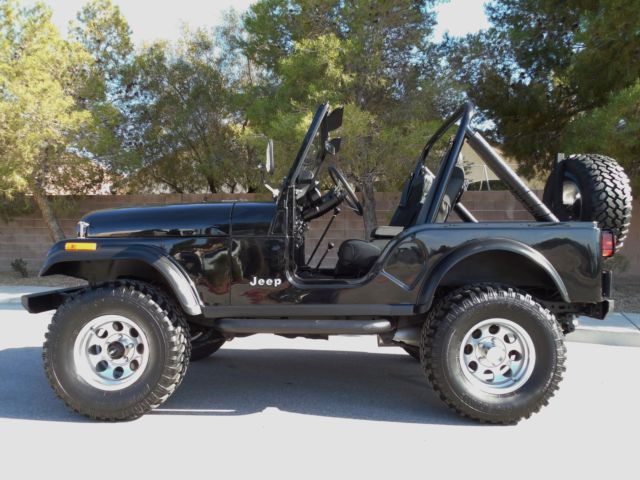 restored jeep v8 - 4 speed - ps - disc brakes - a/c - show and go - see video