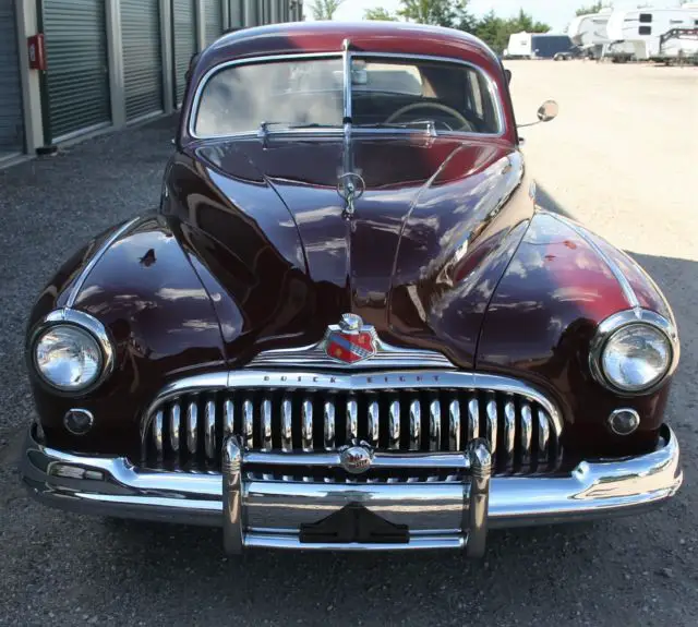 beautiful1947 red buick roadmaster sedan in very nice condition, runs great!!!