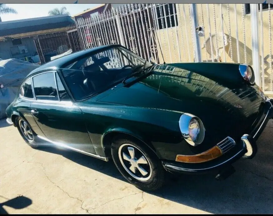 1969 porsche 911 e , vintage rare limited count for this dark green exterior