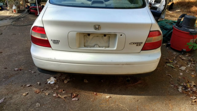 1994 honda accord lx. white. car is not running. it has a broken timing belt