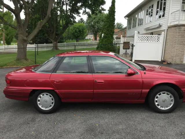 1994 red mercury sable ls 4-door sedan, low miles, 3.8l one owner 57715 miles