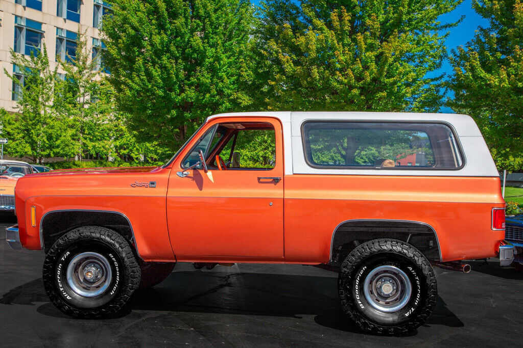 1977 gmc jimmy orange metallic 350ci 4-spd 4wd suv