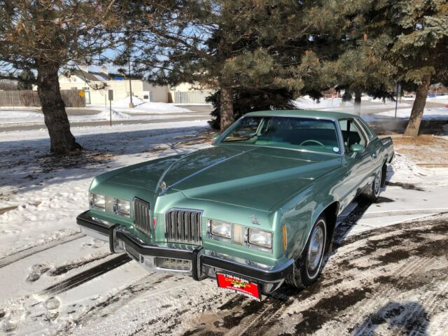 1977 pontiac grand prix coupe 59850 miles green 2-dr. 400cu auto