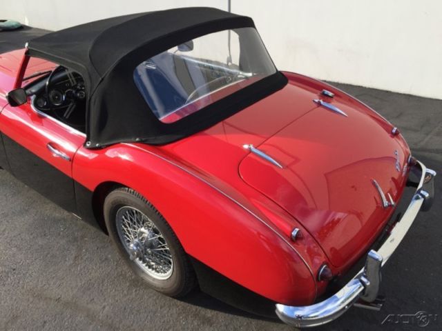 1958 austin -healey 100-6 bn-6 two-seater roadster. red/black. 4-speed over tran
