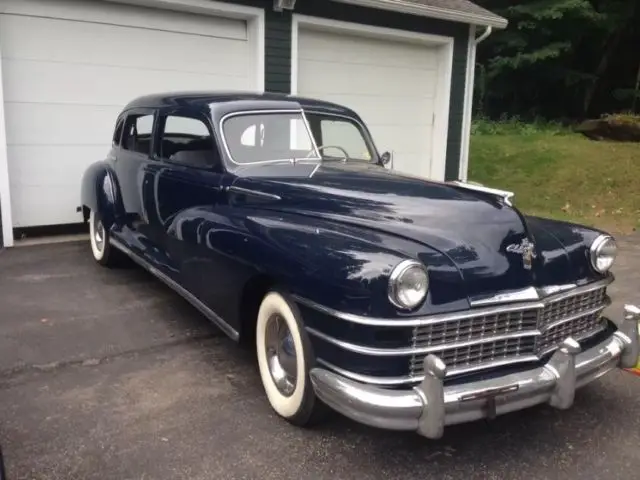two chrysler imperial limousines