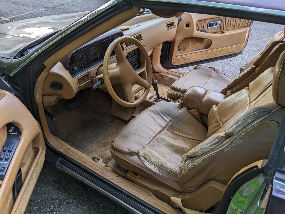 58k miles. royal cabernet pearl. removeable body color hardtop