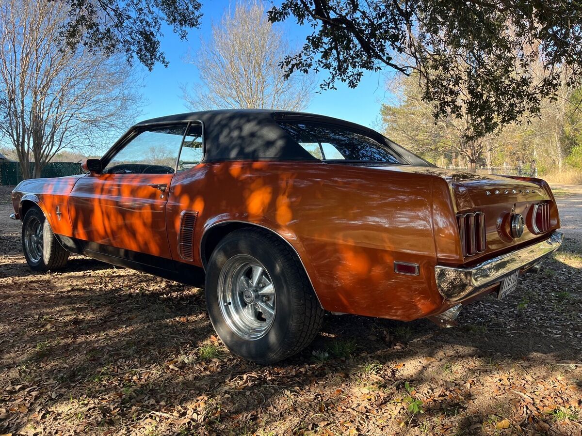 1969 ford mustang orange rwd automatic gold