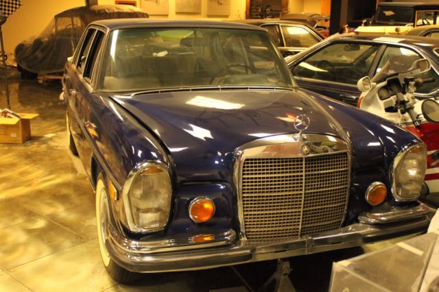 this 300sel 6.3 1969 / a driver that was painted with new bosch euro headlights