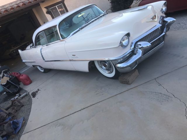 1956 cadillac sdv...calif barn car, runs well, ac, orig. pink car. very solid