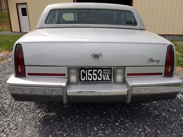 second owner, low miles, always garaged, beautiful paint cadillac, 26 mpg hwy