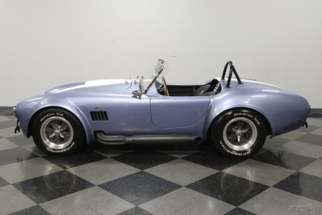 stroker manual transmission blue white stripes black interior roadster 1965