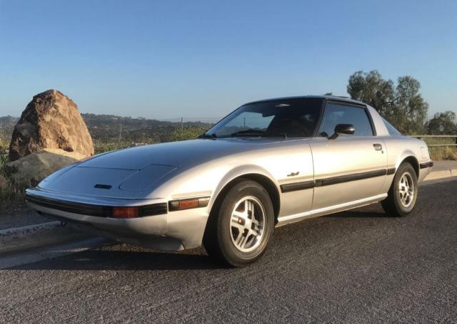 all original gs silver/black interior 5spd sunroof nice survivor!