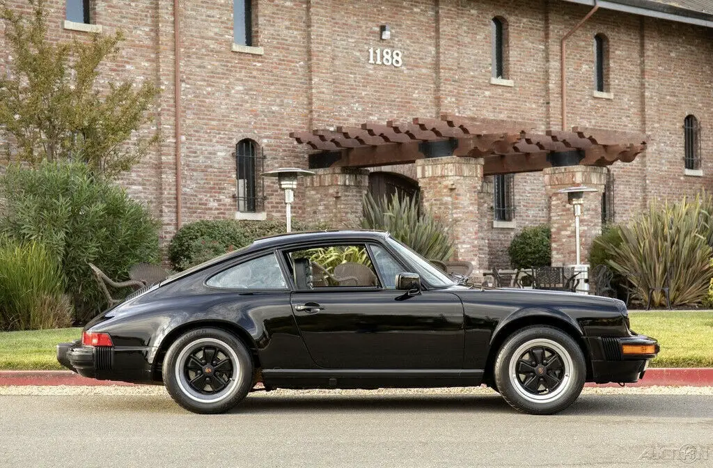 survivor! 30k orig-mile 1-owner garaged blk/blk carrera orig paint &window stkr