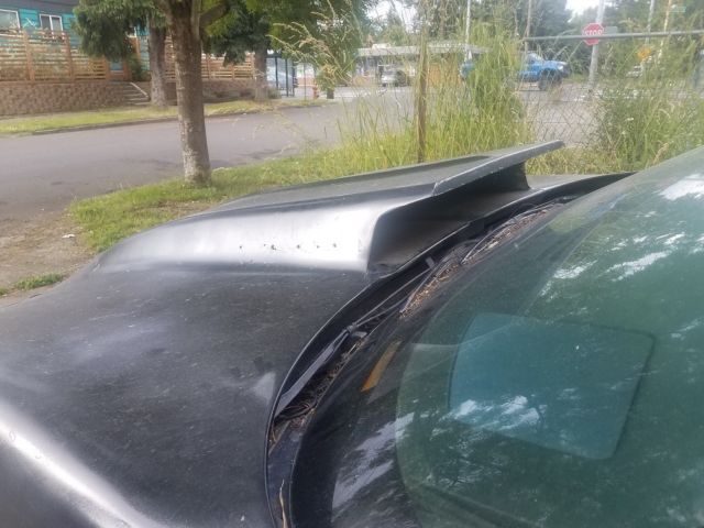 black w/red interior runs and drives, clean oregon title & new-ish tires