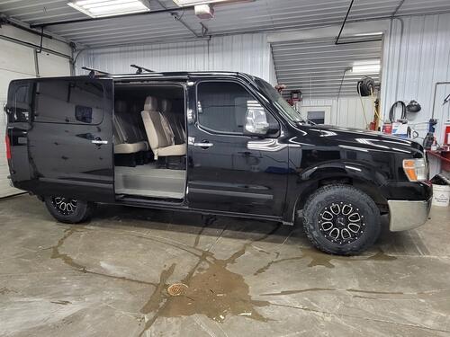 2013 nissan nv 3500 with 176k miles that seats 12. this van has been very reliable