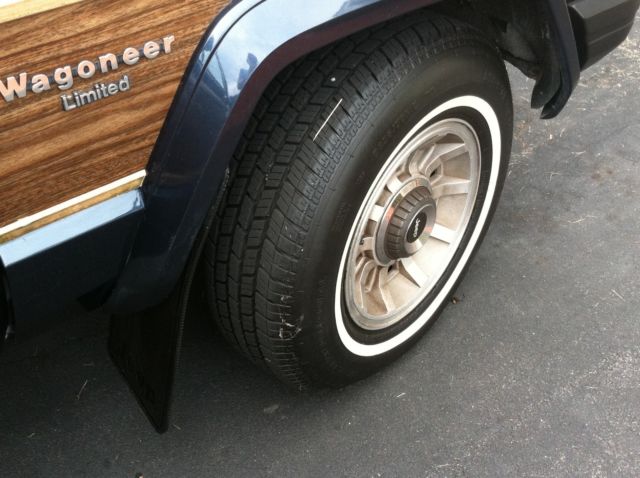 classic jeep (cherokee) wagoneer limited in metallic navy & wood grain decals