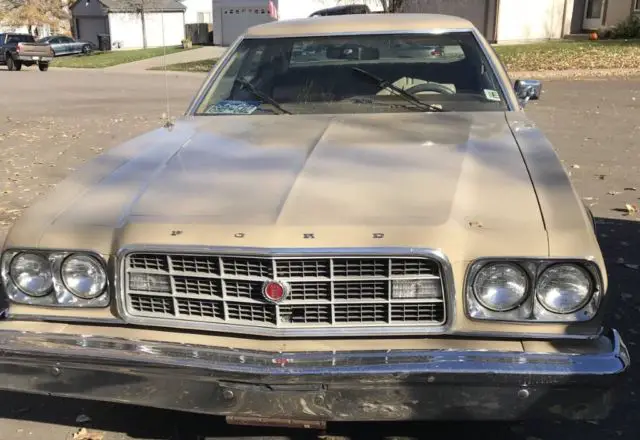 1973 tan colored ford gran torino
