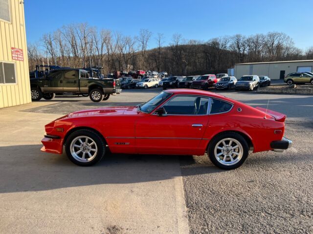 1975 datsun 280z coupe orange rwd manual