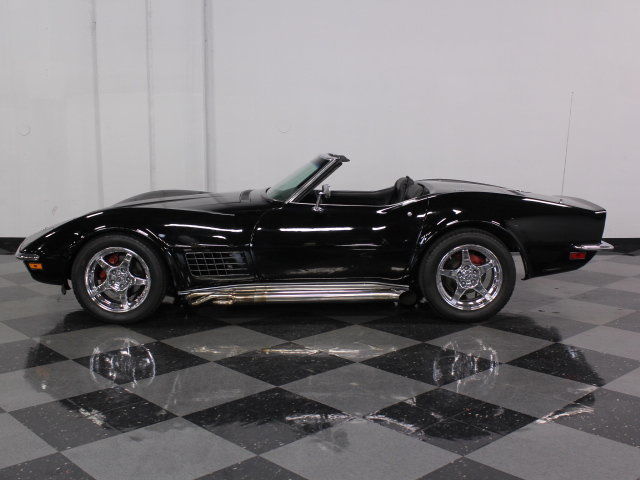 stroked 383 motor, arp aluminum heads, sidepipes, slick black paint, convertible