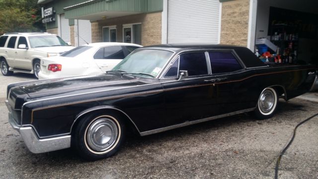 1966 lincoln continental w/ suicide doors