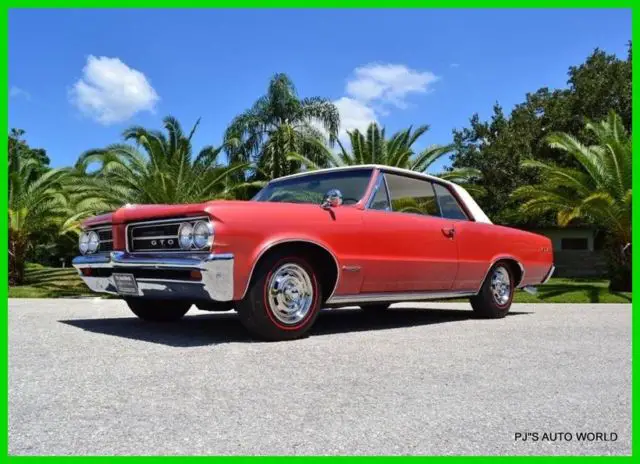 389 v8 4-speed rare sunfire red ivory cordova top