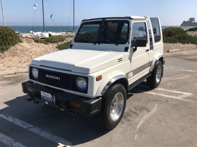 super nice! 105k miles original samurai 4x4, 4wd, removable hardtop, not a jeep