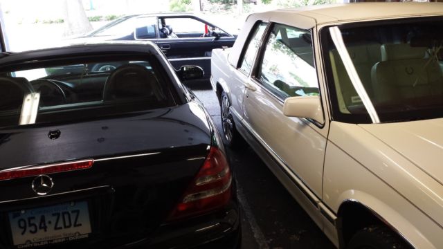 1991 white/white cadillac coupe deville....104,000 original miles