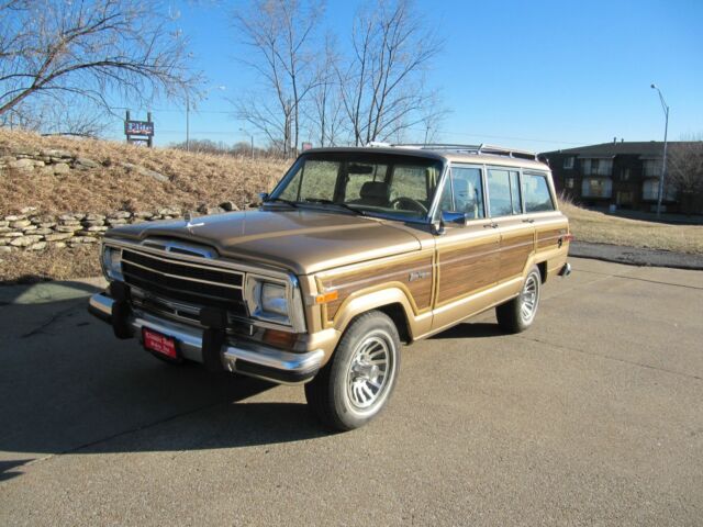 1989 jeep grand wagoneer restored like new- gold loaded 4x4 like new 8 cyl 4