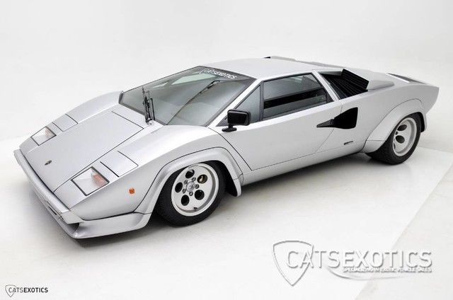 restored by george evans automotive - signed by valentino balboni