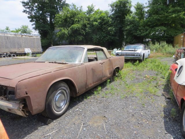 may delver two cars air in one 1965 parts car both in 1 location parts