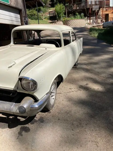1957 chevrolet 210 sedan white rwd manual bel air
