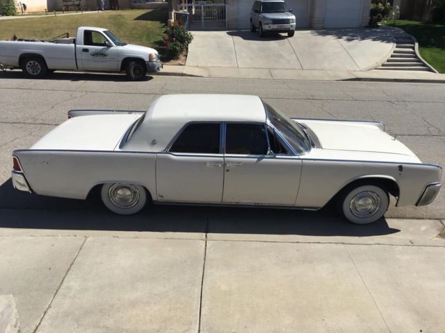1961 suicide door lincoln continental