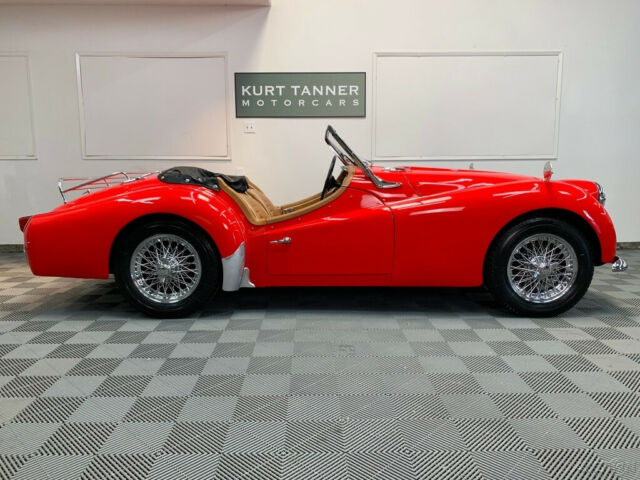 1960 triumph tr3a sports roadster. red. older restoration still showing well