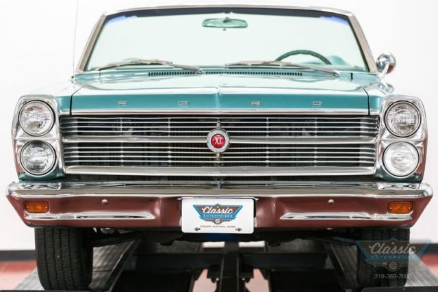 convertible with bucket seats, console, power top, and power steering very clean