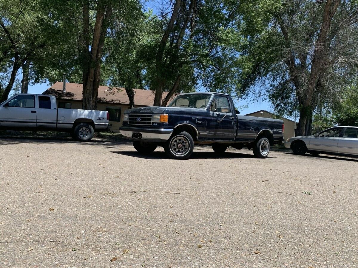 1990 ford f-150 pickup blue 4wd automatic xlt lariat