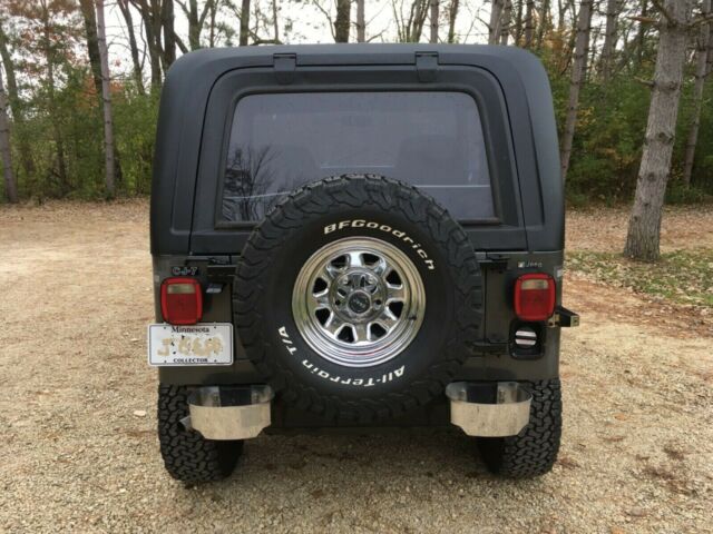 1986 jeep cj-7 laredo, orig unrestored, 4m charcoal met, 258, 5 spd, a/c, 36k mi