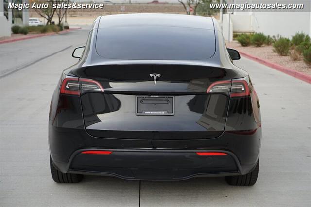 2021 tesla model y standard range rear-wheel drive