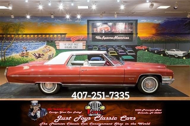cadillac deville burgundy metallic with 13,242 miles, for sale!