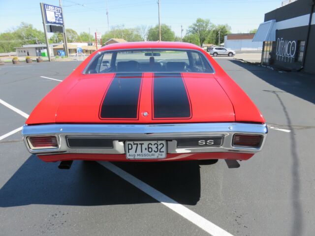 "restored cranberry red 70 chevelle ss454 black stripes cowl induction, buckets"