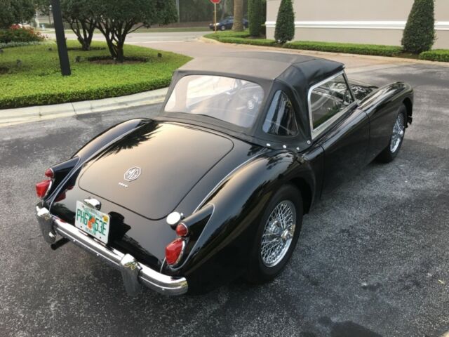 body off restoration, chrome wires, leather, disc brakes, call don 407-497-2122