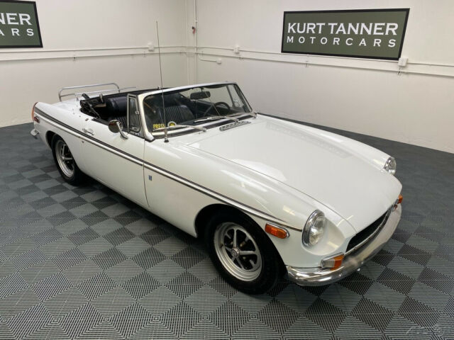 1972 mgb. glacier white with black trim. 4-speed. rostyle wheels. good driver