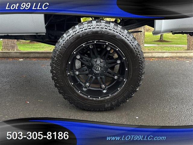 2000 ford f-250 lifted 310hp 35's 20 wheels