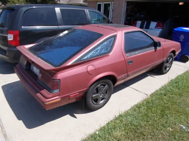 1986 dodge daytona hatchback, 98k orig miles. comes with large parts stash