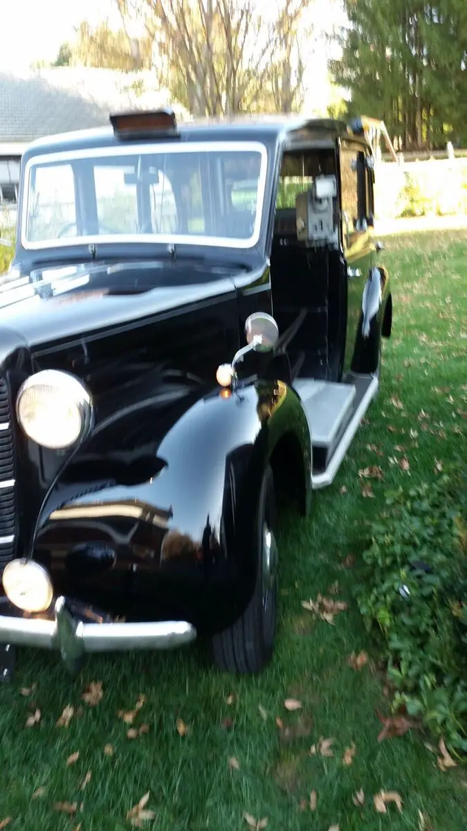 1957 austin 16 black taxi