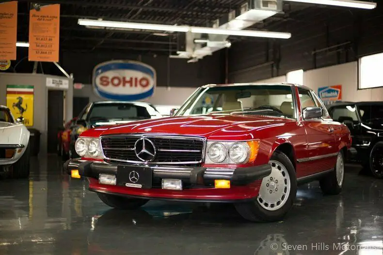 only 42,895 miles, excellent condition, signal red/tan, priced to sell!!