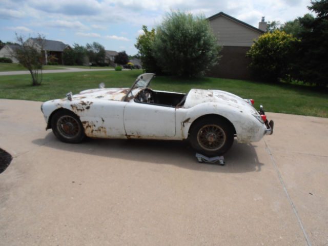1960 mga wire wheel roadster and a 1957 wire wheel roadster qty of 2 cars