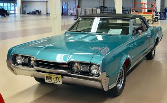 rare factory 4 speed , with w-30 code k aquamarine convertible