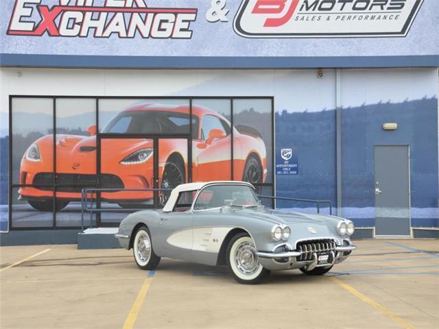 1960 chevrolet corvette convertible sateen silver red,matching #'s 2 owners